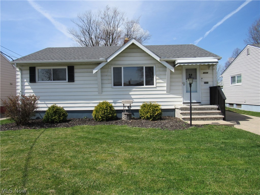 Be first or be sorry! Turn the key & move in to this three bedroom Ranch on a quiet, low traffic street. Updated kitchen with granite countertops, stainless steel appliances and pantry! Dining room has big window! Refinished hardwood floors. Main bathroom also updated with a composite countertop. Basement has recreation room, laundry room, bonus room and glass block windows. Two car garage with insulated garage door. Fenced yard! Close to baseball fields, basketball and bocce courts. Walk to City Hall, park and library! Includes one year home warranty!