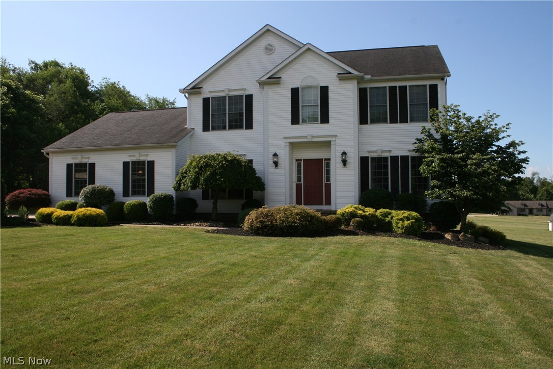 A beautiful, tastefully updated newer built home in Manchester LSD. This gem is more than move in ready. The home boasts brand new, high quality carpet throughout and an intricate ceramic tile pattern. You will enjoy the new back splash and granite countertops, including a kitchen island for those who like convenient cooking. First floor has a lovely open floor plan which includes first floor laundry, a walk-in pantry, a formal dining room and sitting room. Step out of the kitchen onto a raised all brick patio, with a new Sunsetter awning - the biggest one available - giving you unlimited shade for outside eating and relaxing. Plenty of yard for the kids and pets to run around. The upstairs contains 4 big bedrooms, all with ceiling fans, plenty of closet space and 2 full baths. Through the double doors, you will find the master suite, which has vaulted ceilings, a walk in closet, and a huge master bath with a large soaking tub, shower, his and hers sinks, and another closet. The 13