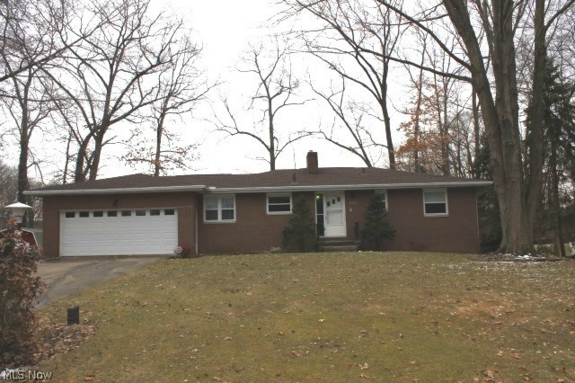Solid built 3 bedroom, 2 bath brick ranch in the City of Green on cul de sac w/1618SF incl. walk out rec room* Open floor plan* Living room with slider to maintenance free deck* Kitchen w/Corian counter top, breakfast bar, updated refrig & DW, ceramic back splash, pantry & spacious eating area* Master bedroom w/fan & master bath* Walk out rec room w/WBFP w/wood burning insert* Glass block basement windows* Oversized windows, replacement & tilt* Furnace 6/2002* Aprilaire media cleaner* Wired for security* Attic fan, central air* Shingles 12/2011, 40 year* Dishwasher 12/2012* Leaf guard* Workshop w/shelving, peg board & work bench* Reverse osmosis system* 2 car attached garage* Neutral décor thru out* Overlooking pond* Covered patio w/gas hook up for grill* Storage building* Home warranty provided* A must see!