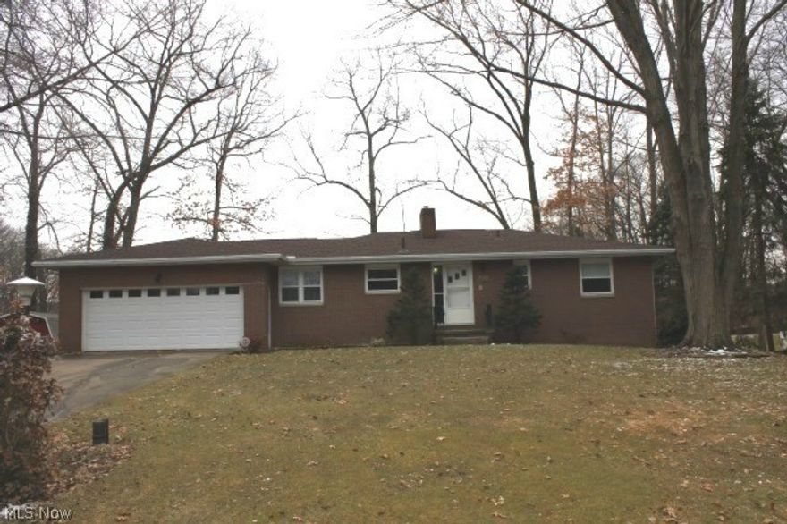 Solid built 3 bedroom, 2 bath brick ranch in the City of Green on cul de sac w/1618SF incl. walk out rec room* Open floor plan* Living room with slider to maintenance free deck* Kitchen w/Corian counter top, breakfast bar, updated refrig & DW, ceramic back splash, pantry & spacious eating area* Master bedroom w/fan & master bath* Walk out rec room w/WBFP w/wood burning insert* Glass block basement windows* Oversized windows, replacement & tilt* Furnace 6/2002* Aprilaire media cleaner* Wired for security* Attic fan, central air* Shingles 12/2011, 40 year* Dishwasher 12/2012* Leaf guard* Workshop w/shelving, peg board & work bench* Reverse osmosis system* 2 car attached garage* Neutral décor thru out* Overlooking pond* Covered patio w/gas hook up for grill* Storage building* Home warranty provided* A must see!