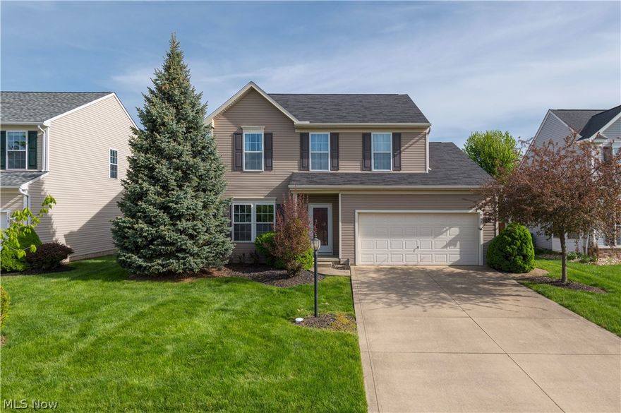 Welcome to this well-maintained 3-bedroom, 2.5-bath Colonial located in the desirable Sandstone Ridge community in Berea. Offering a functional and inviting layout, the generous first floor features a spacious open family room with a gas fireplace and an eat-in kitchen with ample space for dining, as well as a large dining room and a convenient first-floor laundry room. A two-car attached garage provides added ease for daily living. Upstairs, you’ll find three generously sized bedrooms, including a comfortable primary suite with a primary bathroom featuring a soaking tub, separate shower, and a walk-in closet. The second level also includes a versatile bonus room, ideal for a home office, additional living area, or flexible space to suit your needs. The unfinished basement offers a substantial footprint, providing excellent potential for future finishing or additional storage. Step outside to a fully fenced-in backyard complete with a stone patio—perfect for entertaining, relaxing, or outdoor dining. This home offers a great balance of space, functionality, and opportunity in a sought-after location that has a great sense of community and is close to local amenities, parks, and highways.