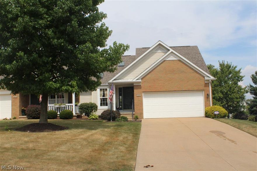 Absolutely fantastic condo... completely remodeled from top to bottom. All new wide plank distressed wood floors throughout the entire first floor. Kitchen has new stainless GE appliances, granite counters, new back splash, new fixtures. Large dining room and great room with custom tile around the gas fireplace with wooden mantle.  Sun room off the great room has french doors leading to a private deck. First floor master and laundry. Master bath was a complete remodel and a custom tile shower, new fixtures & counters installed. Loft with a 2nd bedroom and full bath. Basement is also finished with a rec room, 2nd fireplace, 3rd full bath and an office... must see!