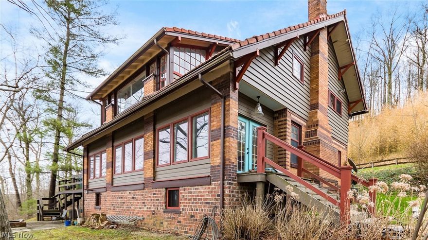 Escape to your own private riverfront retreat with this one-of-a-kind property offering both residential comfort and Bed & Breakfast potential. Featuring 5 bedrooms and 4.5 bathrooms, each spacious bedroom includes its own private bath, making it ideal for hosting guests or multi-generational living.

The main level showcases beautiful hardwood floors and welcoming living spaces, all enhanced by the home’s stunning setting along the Muskingum River. Enjoy panoramic views overlooking Lock 11 at Ellis Dam from the main floor front porch and second-floor sleeping porches. A whole-house generator adds peace of mind year-round.

Set on 4.35 wooded acres, the property offers privacy, abundant wildlife, and direct river access complete with a private beach. The 24x32, 4-car garage, built in 2016, features a concrete floor and 220V electric service, along with an additional concrete pad for extra parking. The attic space above the garage provides excellent storage or the potential for a future apartment or guest suite.

Recent updates include a new sewer line to the septic system (2022), hot water heater (2022), well pump (2022), and A/C unit (2022). Located well above the flood plain, this property does not require flood insurance.

A rare opportunity to own a scenic, versatile waterfront property with endless possibilities.