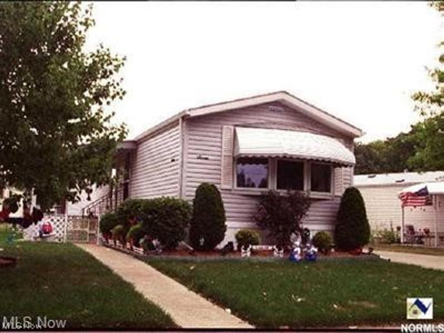 COLUMBIA PARK IS A 55 AND OLDER CONCEPT OF LIVING and is Ohio's Premiere Adult Land Lease Community! Amenities include: Gatehouse managed entrance! On site Shopping Plaza! On site Management! Walking Path/Dog Walking Path! Shuffleboard! Bocce Ball! Library! Crafts, and Social Hall! WELCOME  HOME to this adorable 1996 Schult Singe wide Manufactured Home.  This home offers 980 sqft, measuring 14 x 70, featuring 2 Bedroooms, 2 Baths, Living Room, Eat in Kitchen and Laundry area.  The bedrooms are on opposite ends of the home.  There is also a three season room enclosure which is newer than the home.  The HVAC System was replaced approximately five years ago.  The garbage disposal was changed out in 2001 and the Washer is newer.  HOME SWEET HOME !!!!!!  Why not make it yours....