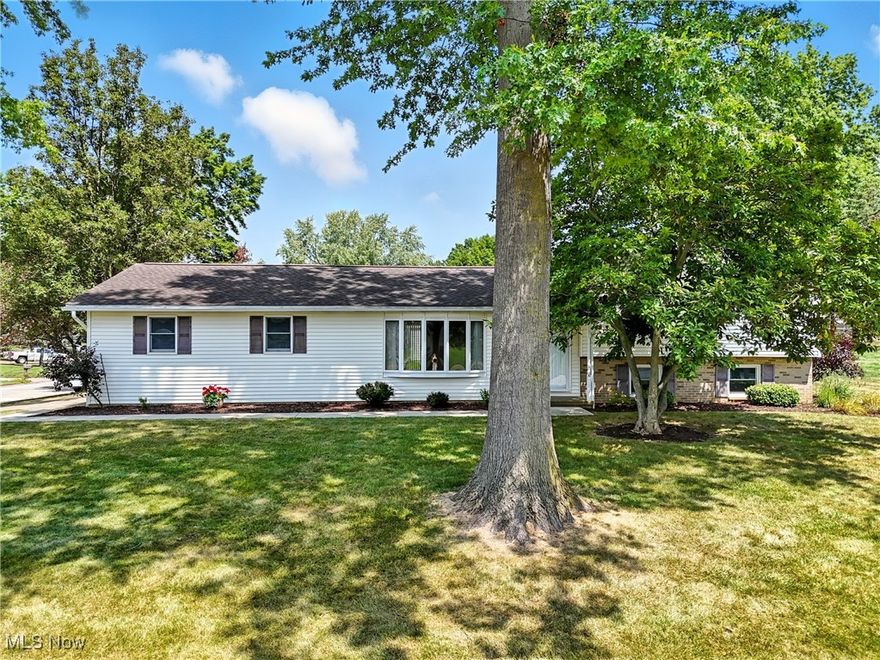 Searching for a home with charm, space, and a great location? This gorgeous split-level sits on a spacious corner lot in the heart of Canal Fulton and offers the perfect blend of comfort and convenience. The main level features a bright living room and an updated kitchen that’s as stylish as it is functional. Upstairs, you’ll find three comfortable bedrooms and a full bath, while the finished lower level provides additional living space with a half bath and a cozy fireplace. Outside, enjoy an attached two-car garage and plenty of yard space for relaxation or entertaining. Located just minutes from the historic downtown district, unique shops, local dining, the Towpath Trail, and the scenic Tuscarawas River, this home offers small-town charm with easy access to major highways. Homes like this don’t last long—schedule your private tour today and see why it could be the perfect place to call home!