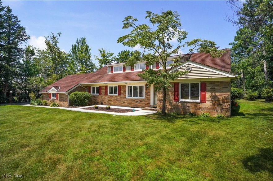 Welcome to 31799 Gates Mills Blvd Pepper Pike OH 44124. Stunning property offers a unique blend of space, comfort, & natural beauty. Nestled on a generous 1.4-acre lot, this home provides a private retreat, ample room to roam & enjoy the outdoors.
Spacious 3,439 square foot interior, thoughtfully designed to accommodate a modern lifestyle yet continue the charm from the original build & addition of the Great Room. Home features 4 well-appointed bedrooms & 2.5 bathrooms, providing comfort & convenience for family & guests. Expansive living areas are perfect for both relaxing & entertaining, w/ seamless flow from room to room. Living spaces include multiple areas in the Great Room, Living Room, Den/Sitting Room, Sun Room & Lower Level Family Room w/ 3 rooms of fireplaces.
Home meticulously maintained & thoughtfully updated. Recent improvements include laminate & carpet installed in 2022, new front walkway in 2023, and a new garage door in 2024, interior & exterior were freshly painted in 2023, enhancing the home's maintained condition. For added peace of mind, a whole-home generator was installed in 2019. Septic was removed & hooked to public sewer 2021, front sidewalk 2023, public water, glass block lower level windows, LR window, rear patio, Generac, & much more including certifying knob & tube electric, replacing electric panel, adding GFCIs & exterior proper outlets! HVAC 2005
Priced @ $525,000, this exceptional residence presents a rare opportunity to own a significant piece of property in a desirable location in the Cleveland suburb of Pepper Pike. Experience the perfect combination of an expansive private lot & beautifully & maintained home. Perfect for 1st floor living w/ 2 bedrooms & 1.5 bathrooms as well as 2 bedrooms & full bath on the 2nd floor for multigenerational living. The property feels like you're in the country w/ 1.4 acres yet you're close to so many points of interest that Cleveland & Pepper Pike have to offer! One year home warranty included.