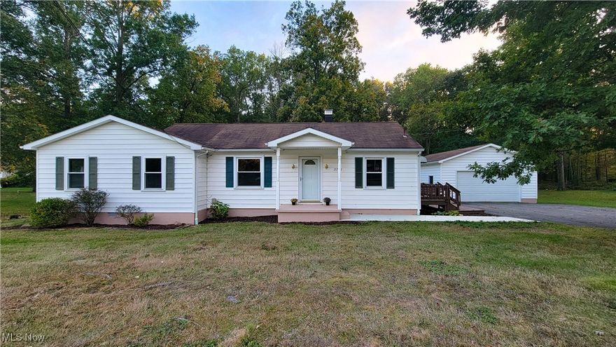 Welcome to this beautifully updated 3-bedroom, 2-full bath home that is situated on a spacious 1.84-acre lot. With 1,276 square feet of living space, this property features brand new carpet throughout, solid oak trim, and fresh paint, creating a warm and inviting atmosphere. The 2.5 car garage provides ample storage for vehicles, hobbies, or extra storage needs. Whether you're a first-time homebuyer or looking to downsize, this home offers the perfect blend of comfort and modern updates. The expansive lot invites outdoor living, gardening, or just enjoying the tranquility of nature. Don't miss out on the chance to make this charming home yours! Schedule your tour today!