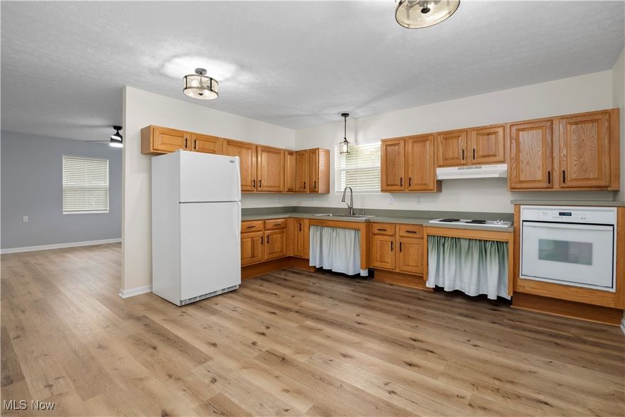 This charming 3-bedroom, 1-bathroom ranch home, located in the heart of Lorain, Ohio, offers both comfort and convenience with 100% ADA compliance, ensuring full accessibility for all. Built in 2005 and spanning 1,140 square feet, this home features a thoughtfully designed open floor plan on one level, with no basement making daily living easy and efficient.

Situated on two lots in the Clearview School District, the property offers ample outdoor space and privacy. The home comes equipped with a newer hot water tank (2022), a roof that's approximately 10 years old, a furnace serviced earlier this year, and central air keeps the home comfortable during the summer months.

The exterior features a two-car carport with a convenient car gate, allowing easy transfer of groceries or other items directly into the home. Freshly stained ramps and newly installed storm doors further enhance the property's accessibility.

Inside, the home boasts numerous renovations, including new flooring throughout, fresh paint in every room, and modern updates like a new kitchen sink and updated fixtures on all doors and cabinets. The first-floor laundry is an added convenience, making household chores a breeze.

Security is also a top priority, with a security system in place and all appliances staying, making this home truly move-in ready. Its prime location offers quick access to local highways, restaurants, and shopping, making it perfect for those seeking both a quiet neighborhood and the convenience of nearby amenities.

This well-maintained, accessible ranch is a rare find and won’t last long! Don’t miss the opportunity to make this thoughtfully upgraded home yours.