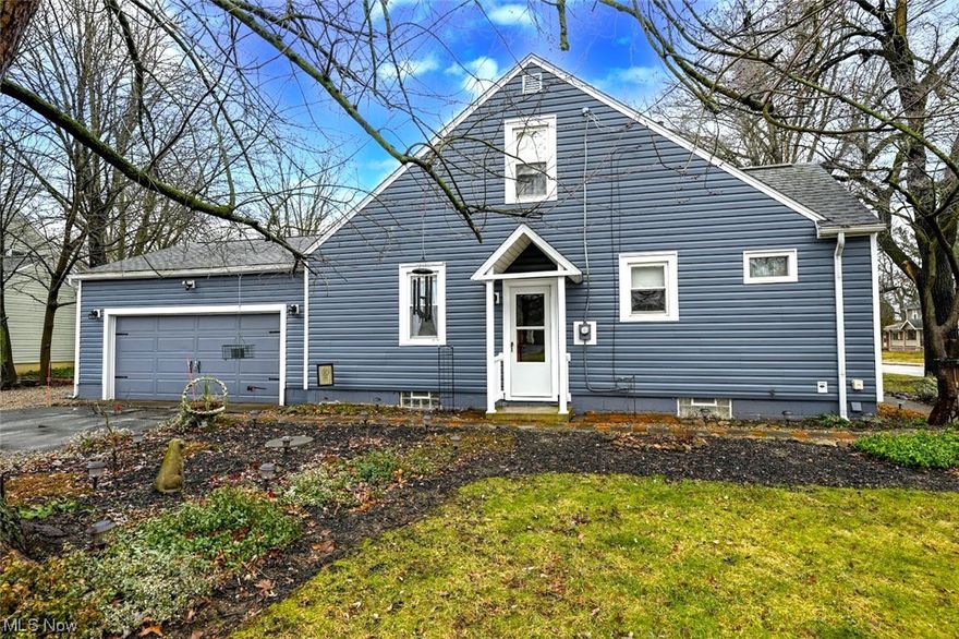 **Winner Of Akron's Beautification Award For Several Years ~ This Well Maintained Solid Nw Akron Home Located Near Sand Run Features 1,042 Sq. Ft, 3 Bedrooms, 1 Bathroom, Full Basement & 2 Car Attached Garage! *TWO First Floor Bedrooms *Updates Include: NEW DIMENSIONAL ROOF & GUTTERS 2022, NEW SIDING 2022, NEW WINDOWS, Kitchen- Professionally Painted Cabinets W/Sherwin Williams Paint, Bathroom- NEW Toilet, Sink & Vanity, <15 YRS. CARRIER FURNACE & AC, H20 TANK *Walk In To A Living Rm W/Beautiful Hardwood Floors & Double Windows For Abundant Natural Light *Eat In Kitchen Showcasing Slate Blue Cabinets W/Custom Built In Cutting Board, Triple Stained Glass PENDANT Lighting + Above Sink Pendant Lighting, TILE Backsplash, Stainless Faucet & Sink, FULLY Applianced W/Gas Stove, Refrigerator & Dishwasher *TWO First Floor Bedrooms W/Hardwood Flooring & One W/A Ceiling Fan *Spa Inspired Light Blue Full Bathroom W/Tall Ceiling Boasts A New White Vanity & Sink, SS Faucet, Shower & Tub *The Grand Master Suite Upstairs Has TWO (2) Closets PLUS A Walk In Closet (Used to be a half bathrm) & Is Currently Used For Crafting *Full Basement W/Storage Room To The West + A Small Area Where A Toilet & Door Used To Be + Laundry Room To The East Including A Washer & Dryer That Stay! *Pavers, Pea Gravel, Asphalt ~ LOW MAINTENANCE YARD! *MOVE IN READY *Ask Your Lender About LOW Downpayment Programs - All Financing Option Types Accepted of Conventional, FHA, VA *Convenient Location Located Near West Market Street & Close To Many Amenities! *Live Video Walk Through Tour