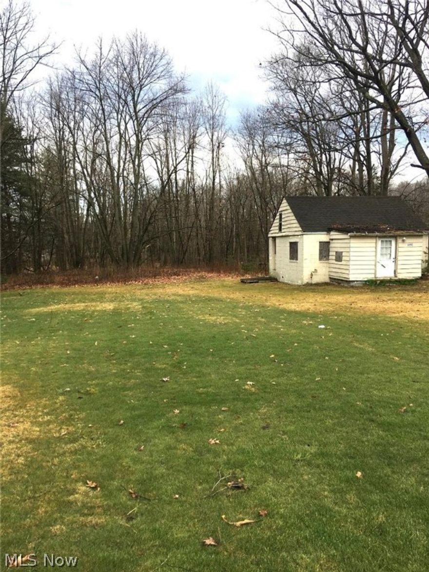 1 acre building lot across from Molnar farm wooded area in back, existing well and septic is uncertain of quality or condition