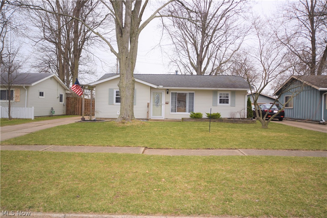 Welcome to 453 Walnut Drive! This 3-bedroom, 1-bathroom home is located in a quiet neighborhood in Berea. The kitchen has ample cabinet space and lovely new laminate floors. Bonus room in the back of the house can be used as a second living room, play room, etc. Updates throughout home include new interior and exterior doors and frames, trim, carpet, ceiling fans, and light fixtures. The home was also repainted in 2018, giving it a clean, fresh look. A privacy fence fully encloses the beautiful backyard. Wooden patio provides a great place to relax or entertain guests outside. This home is conveniently located near shopping, schools, and parks. Call today for a private showing!
