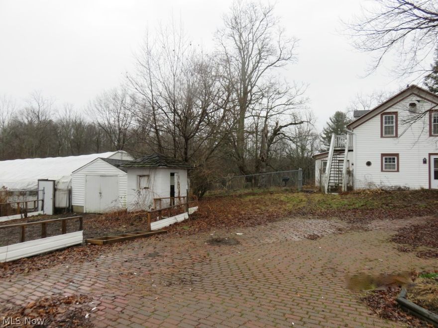 This is a Fannie Mae Homepath property. This property is being sold for land value only. Main house had a house fire. Property is 2.96 acres and is set up for aquaponics gardening.