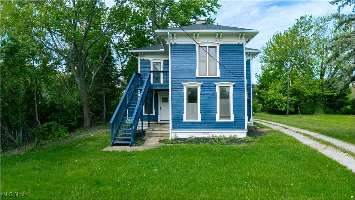 Welcome to 9324 Columbia Road—an updated duplex in charming Olmsted Falls that offers flexibility, income potential, and style all in one. Whether you're just starting out and want help with the mortgage, or you're looking to expand your investment portfolio, this property is a smart move.
The downstairs unit features two spacious bedrooms, a large living and dining room with tall ceilings, a convenient mud/laundry area, and a beautifully renovated kitchen with stainless steel appliances and sleek quartz countertops. The full bath includes double vanities, perfect for shared mornings or guests, and the layout flows beautifully for everyday living or entertaining.
Upstairs, you'll find a bright and airy one-bedroom unit with oversized windows, an open-concept family room, and a fresh new kitchen complete with quartz countertops, an island, stainless steel appliances, and in-unit laundry. It’s ideal for a tenant, an in-law suite, or even short-term rental potential.
Both units are filled with natural light and thoughtfully updated. The home has a brand-new roof and gutters, an updated electrical system, and a two-car garage with electric—move-in ready, inside and out. Sitting on nearly half an acre, the yard offers space to garden, play, entertain, or simply relax.
Located just minutes from Baldwin Wallace University, Grand Pacific Junction’s historic shops and restaurants, and David Fortier River Park’s scenic trails and waterfalls, you’ll love the small-town charm with big-time convenience. Swings-N-Things is nearby for year-round fun, and easy access to I-480 and I-71 gets you to downtown Cleveland, Hopkins Airport, and major hospitals in no time.
Live in one unit and rent the other—or lease both and let this versatile, stylish property work for you. With updates, location, and lifestyle appeal, 9324 Columbia Rd is more than a smart investment—it’s a fresh start.