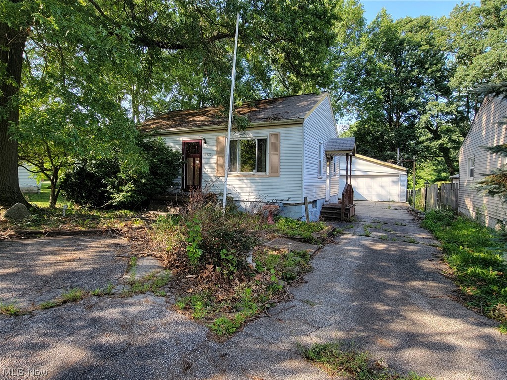 BANK OWNED! Don't let some cleaning and TLC stand in your way of owning this adorable ranch, located in the Howland school district! Great location that is within walking distance to Saint Joseph hospital! Some stand out features include the oversized, attached garage with a few workshop areas, walk-up attic and ample space for your motorcycle or mowers! Fabulous family room with a cozy fireplace, wood accent ceiling and a half bath! Fenced in rear yard is very spacious with plenty of room for your dogs to run and your children to play! There is a nice sized shed and firepit too! The living room to the front of the house could be made into a master bedroom if needed. Full bath is missing the tub and shower but could use remodeled anyway so it's a great head start! Lower level has space for a rec room and additional storage. Minimum earnest money shall be $1000 or 1% the greater. Please provide proof of funds or a pre-approval letter.