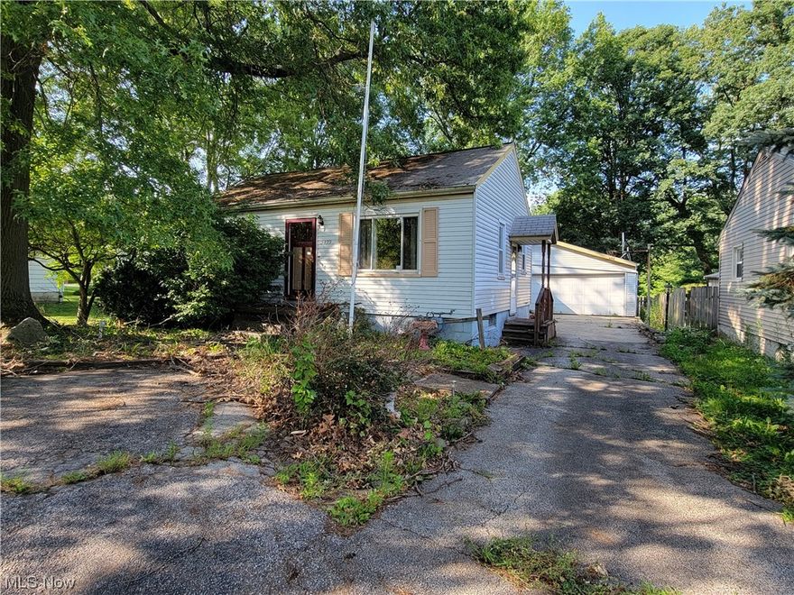 BANK OWNED! Don't let some cleaning and TLC stand in your way of owning this adorable ranch, located in the Howland school district! Great location that is within walking distance to Saint Joseph hospital! Some stand out features include the oversized, attached garage with a few workshop areas, walk-up attic and ample space for your motorcycle or mowers! Fabulous family room with a cozy fireplace, wood accent ceiling and a half bath! Fenced in rear yard is very spacious with plenty of room for your dogs to run and your children to play! There is a nice sized shed and firepit too! The living room to the front of the house could be made into a master bedroom if needed. Full bath is missing the tub and shower but could use remodeled anyway so it's a great head start! Lower level has space for a rec room and additional storage. Minimum earnest money shall be $1000 or 1% the greater. Please provide proof of funds or a pre-approval letter.