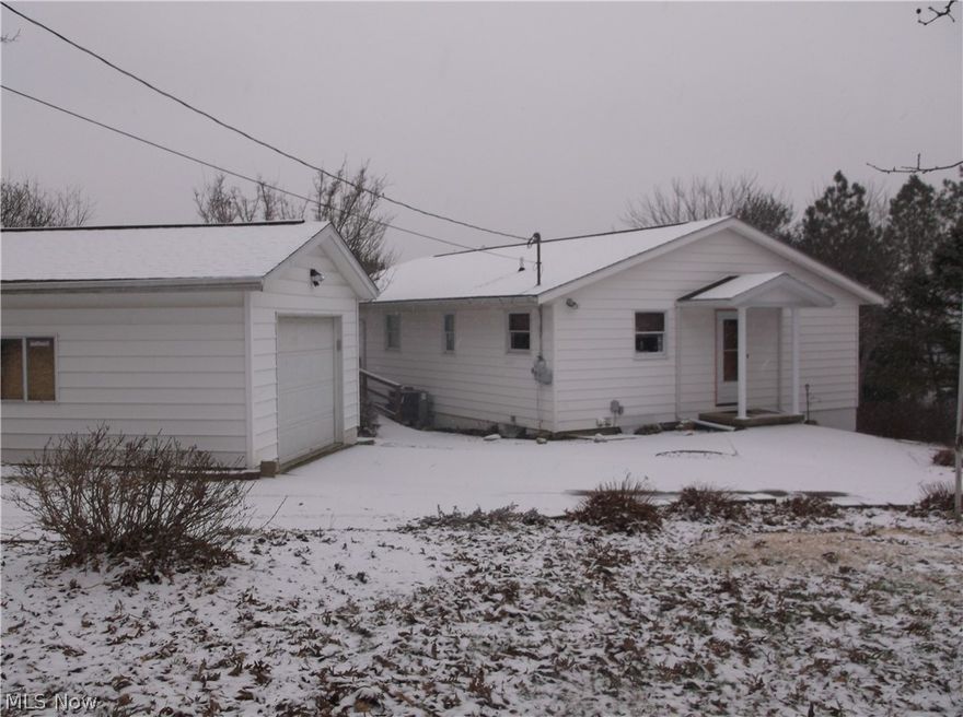 Great home in West Muskingum School Dist. Home is in excellent condition. Finished family room in basement could be 3rd bedroom or man cave. Home has electric baseboard heat in every room for backup to heat pump. New in "2016"- Roof over front door, master bath completely updated. "2017"- New floor and toilet in lower bath, hot water tank, drain installed from top of drive to woods in back plus retaining wall. "2018"- Main water line from meter to house, entry door and new opener on detached garage, Carpet in master bedroom, front storm door, ceiling fan in spare bedroom, new gravel. Lots of road frontage. Walkout door in basement. 2 car basement garage and 1 car detached garage. 5 person hot tub stays. Had new distribution pump installed, control panel, spare filters, new pillows and cover 3 years ago. Had professionally closed by AAA Pools 3 years ago so all new parts are still like new. The sale for $25,000 in "2016" was for 8 acres only, not for the house and the rest of the proper