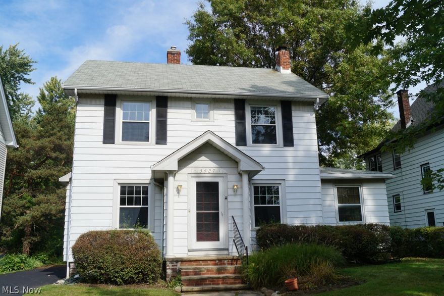 This Super Heights Home Is Calling Your Name!  Fresh & Bright Featuring Large Living Room w/Fireplace. Formal Dining Room.  Den Or Sun Room On First For TV or Office. Hardwood Floors. Updated Kitchen w/Breakfast Nook. 1/2 Bath On First.  3 Bedrooms & Updated Full Bath on 2nd.  Walk Up Attic For Storage. Clean Basement w/Glass Block Windows and Updated Breaker Panel. Fenced Yard. Walk To Library & Cedar Lee Restaurants!