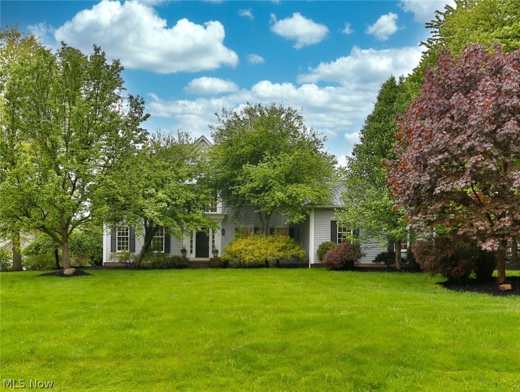 Welcome to this spectacular Hudson colonial located in desirable Bridgewater Place. A spacious foyer greets you and is flanked by the formal Living Room and Dining Room. The updated oversized kitchen has an island and a peninsula bar with countertop seating along with granite countertops and Stainless Steel appliances. Open to the Sunroom and the Sunken Family Room with extra tall ceiling and a gas fireplace makes this an ideal home to entertain large groups or just a family evening in. The first floor office is located just off the Family Room. Large vaulted ceilings in Master Bedroom, Master Bathroom with double sinks, garden tub and walk-in shower and Walk-In Closet. The 3 additional large Bedrooms and an updated Hall Bath round out the 2nd floor. The Lower Level features 2 oversized rooms, an additional office or possible 5th bedroom with newer carpeting and an additional Full Bathroom. This home doesn’t stop there, a large trex deck with a Hot Tub and a lower patio will make you