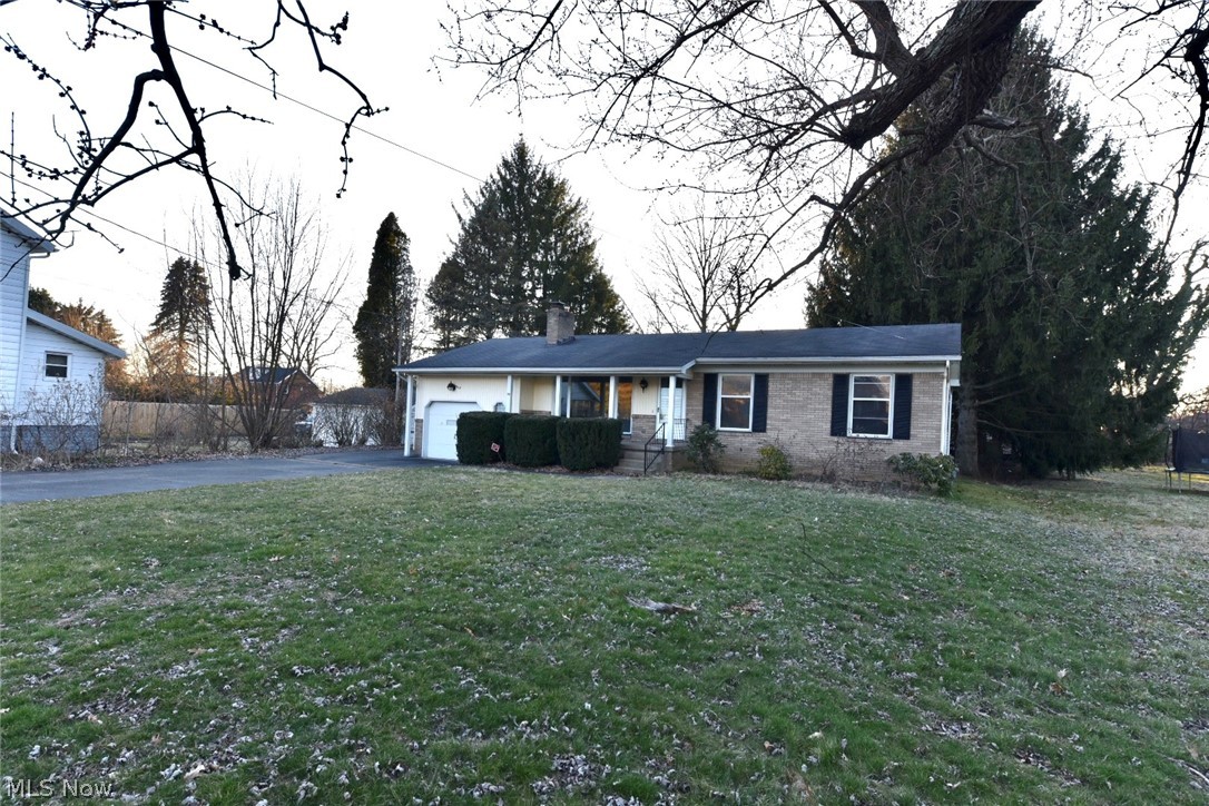 This beautiful Campbell ranch home is looking for a new owner to appreciate all of the updates it has to offer. Truly nothing left to do but unpack those boxes. Enjoy entertaining guests in the nicely sized living room with oversized picture window and beautiful brick fireplace. Dining space with sliding glass doors that lead to a private backyard space. Gorgeous kitchen with beautiful cabinetry, countertops and modern subway tile backsplash. Three generously sized bedrooms and updated full bath. Basement offers great storage space along with an additional full bath. Can't forget to mention the 25' x 32' detached two car garage. Call today for a private tour.