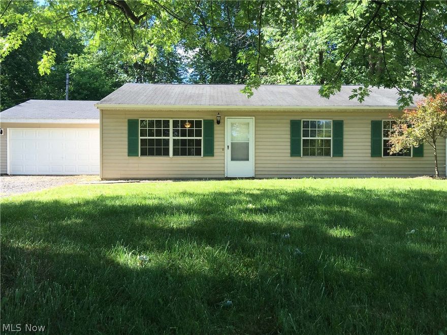 This is the one you have been looking for. A 3 bedroom,  Ranch on a double lot. This home has been updated with new carpet, fresh paint, newer windows, nice kitchen and bath. The nice sized living room is for relaxing and entertaining. You can fit a nice big table in the eat in kitchen. 3 nice sized bedrooms. A huge deep 2 car garage. All ready to just move in! The double lot means one of the biggest backyards around. Last street before Lake Rd. You can see the lake out the front window! Walk to the lake or the park or restaurants. Come and make this house your home before someone beats you to it.