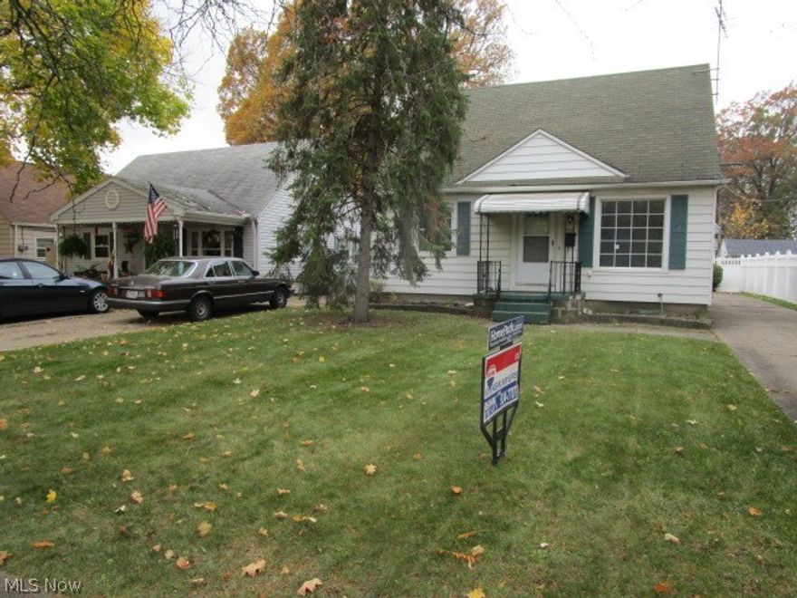 This is a HomePath property. Cute cape style home in Lorain! Covered front entry. Huge picture window in living room. Country kitchen with dining area and side door entry from driveway. First floor bedrooms are spacious with wood floors. Private, upstairs dormer bedroom. Basement has laundry hook-ups and is partially finished as paneled rec room. 1-car detached garage. Convenient location - close to retail shops, parks and schools.