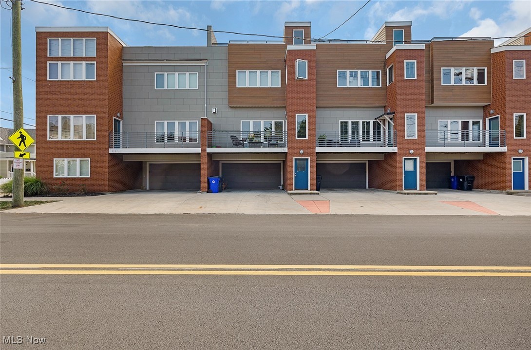Looking for a rare deal in Detroit Shoreway / Gordon Square neighborhood? Want some tax abatement? This is it. Experience sophisticated, low-maintenance living in this stunning 2-bedroom, 2.5-bath condo townhouse at Waverly Station Townhomes. Designed with modern elegance in mind, the home welcomes you with bright, open living spaces adorned with sleek bamboo flooring. The chef-inspired kitchen boasts gleaming granite countertops, stainless steel appliances, and a seamless flow to the dining area—perfect for both everyday meals and entertaining guests. Upstairs, two generously sized bedrooms each feature contemporary baths, offering comfort and versatility. Step outside to your expansive rooftop deck to savor morning coffee or breathtaking Cleveland sunsets. Enjoy the convenience of community living, with shopping, dining, and transportation just moments away. Plus, a tax abatement through 2028 enhances the value of this exceptional home, making it the perfect blend of modern style, luxury, and practicality.
