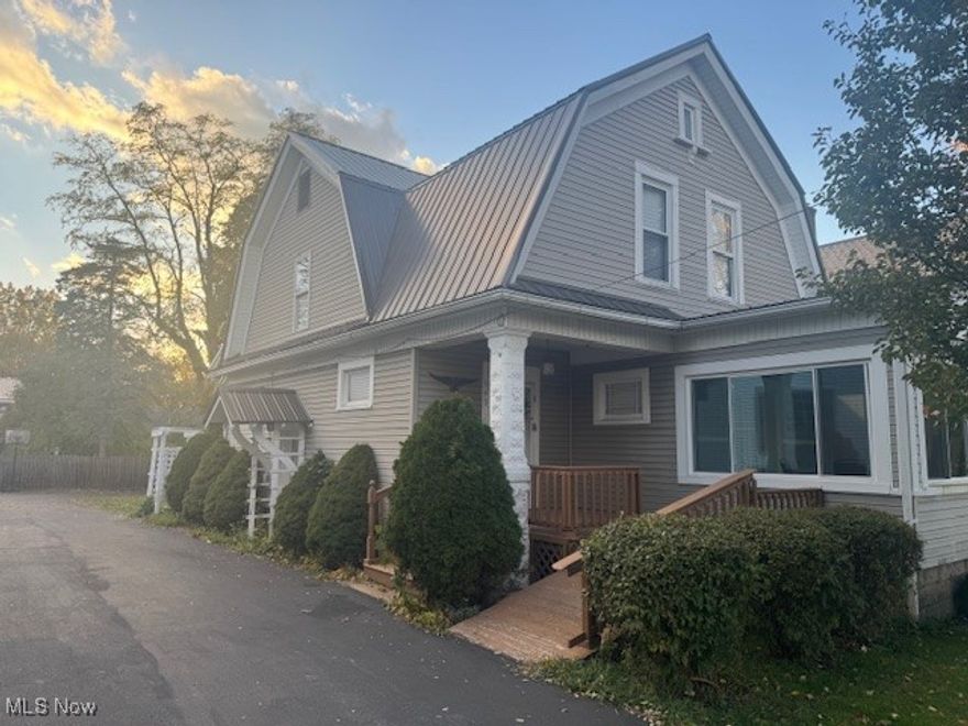 Owner has a job transfer and is offering you this wonderful remodeled home.  Large living and dining rooms.  Eat-in kitchen with new flooring and tin=style ceiling.   Enclosed sunny porch  2 car detached garage and close to Centennial Park.   Open staircase to 3 large bedrooms.  Call today and be the first!