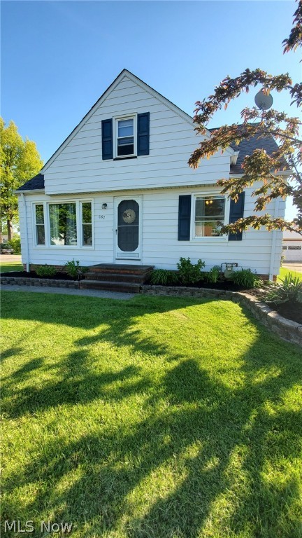Welcome HOME! This unique, and spacious, bungalow is much larger than the typical Willowick bungalow! Walk into your side entrance to a large mudroom/bonus room which offers plenty of room to take off shoes, hang coats and other accessories! Check out your huge & newly remodeled kitchen (2017) featuring abundant espresso cabinetry and granite countertops - perfect place to prepare and share meals with family & friends. The living room boasts neutral decor, lots of natural light, and beautiful hardwood flooring that continue through to two nicely sized bedrooms. The bathroom completes the main floor and was remodeled in 2018, with a beautiful tiled tub surround, all new lighting & hardware! The Master Bedroom is located on the 2nd floor - check out your walk-in closet (can easily be converted/expanded to add an additional bathroom} & ample built-ins, storage - so much space!!! Your basement is partially finished, with plush carpet (2018) - great place to relax and watch tv, entert