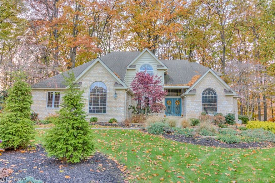 Family Living Oasis! Custom Quality Built Home! 1st & 2nd floors provide 3,487 sq ft. Lower Level with two large family rooms & Kitchenette are an additiona bonus. 
Open 2 story foyer leads to grand Great Room with hardwood floors & brick floor to ceiling center fireplace that is surrounded by windows to view the wooded rear yard. Grand 1st floor Updated Master suite offers large bedroom, walk in closet & remodeled glamour bath that includes custom soaking tub, walk in stone shower & heated floors! Elegant formal dining is ready to entertain! Trayed ceiling & hardwood flooring. Updated eat-in kitchen offers high end granite, stainless steel appliances & lighting. Cozy dinette offers gorgeous views of rear deck & yard. A planning desk is an added bonus! 1st floor Laundry. Fabulous sunroom with vaulted wood paneled ceiling leads to new custom built screened in porch w/cedar ceiling & high end composite flooring that overlooks custom gas firepit & grill patio. 2nd floor offers three gene