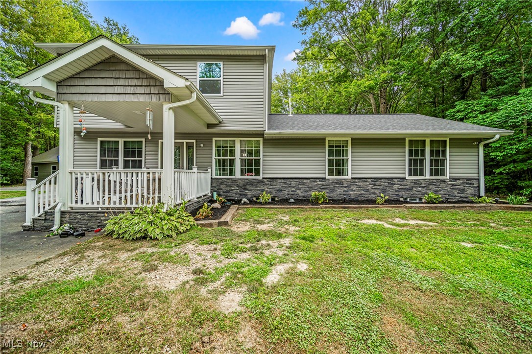 Beautifully updated 4-bedroom, 2.5-bath home situated on over 5 acres in Geneva Township. Features a desirable first-floor master suite, spacious living areas, and a well-designed kitchen. Numerous recent updates throughout. Large outbuilding provides excellent storage or workshop space. Enjoy privacy, a u-shaped driveway, and room to roam, perfect for hobbies, gardening, or simply relaxing in a country setting. Conveniently located near local amenities and major routes. Schedule a showing today!