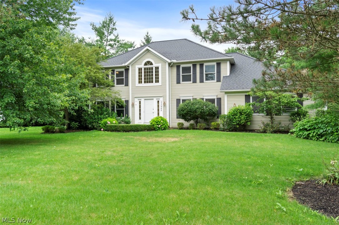 Wonderful home in an excellent neighborhood. Plenty of natural light throughout fills this home with warmth. Spacious kitchen with custom cabinets. Formal dining room perfect for holidays and entertaining. Open family room with fireplace and vaulted ceiling. Comfy living room provides even more space to relax. Half bathroom on the first floor. On the second floor there are three nice bedrooms and a full bath plus a large master suite with walk-in closets and a big bathroom. The finished basement has plenty of rec room space and an additional half bathroom. Awesome deck off of the kitchen and family room leads to a perfect backyard. Recent improvements include roof, HVAC system, hardwood flooring, windows, patio doors, and tankless water heater. Truly an amazing home.