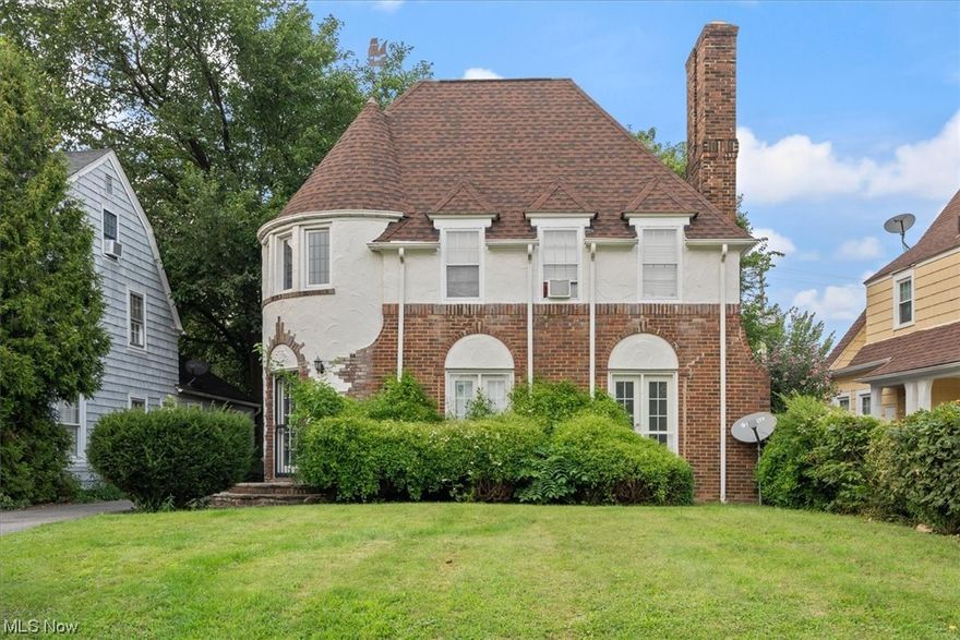 Whether you are an investor, an owner occupant or seek multi-generational housing in a beautiful property, discover this maintained Shaker Heights double outperforming its competition in dramatic curb appeal and showcasing weatherproofed & re-stained cedar shake siding. The owner's suite on the second/third floors lives large, with architecturally alluring appointments, soaring ceilings & decorative beams, and two entire floors of expansive living, including balcony access overlooking the scenic rear yard! Kitchen and baths are tastefully updated. Ceiling fans in most BRs and neutral paint colors. Low maintenance & fully occupied. Recently replaced furnace & hot water tank (for upstairs suite); downstairs mechanicals functioning well. Hardwood floors believed to underlie carpeting (please do not verify). Tenants pay all utilities except sewer/water. Third floor is rented with second floor unit, totaling 4BRs and 2 Full Baths for unit two and another 2BR, 1BA for the first floor suite; the latter also features newer French doors. Cavernous lower level with secure storage closets & vented glass block windows. CERTIFIED LEAD FREE! Enjoy positive cash flow in an award-winning school district while still in close proximity to downtown Cleveland, University Circle hospitals & universities and the many offerings of Cleveland's East Side, a walk away from shopping, public transportation, and A+ city amenities. Modest POS list will be completed by TT. Take title & start making money!