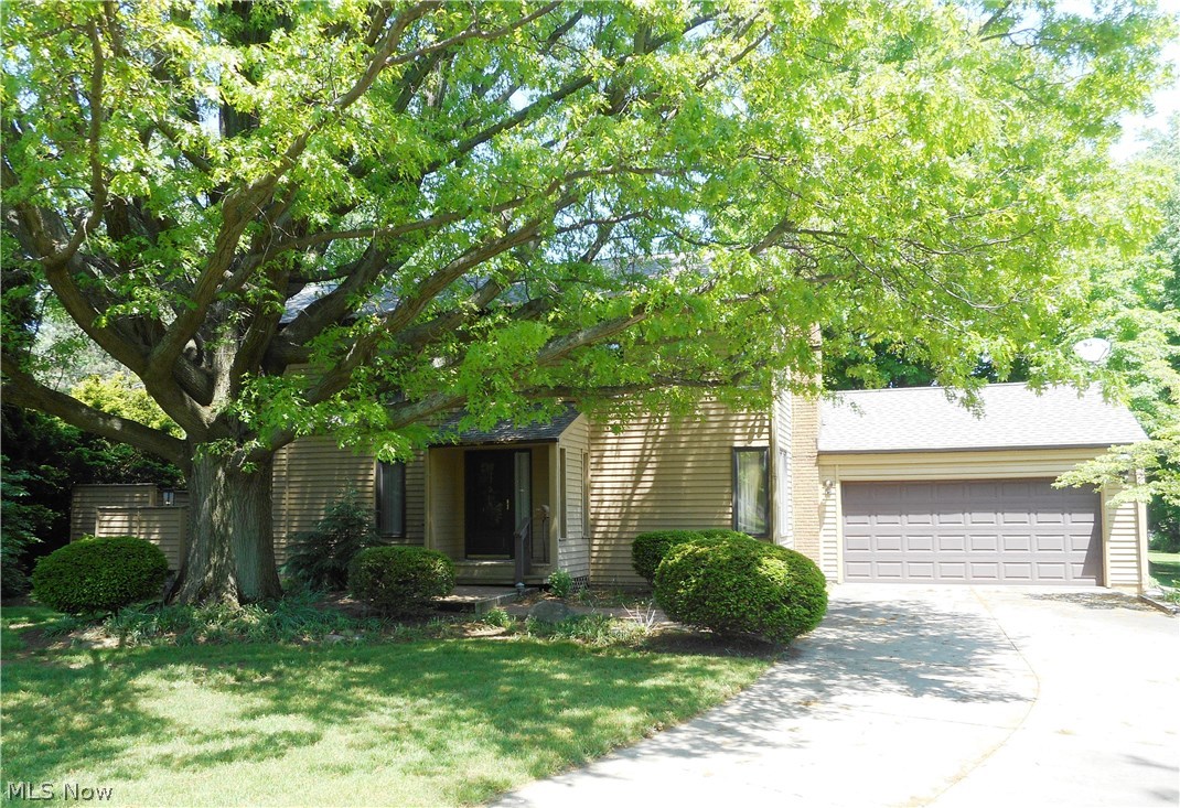 Situated on a cul-de-sac this two story offers 4 bedrooms and 2.5 baths. There is plenty of room for entertaining with both a family room and a spacious living room, plus a dining room with doors that lead to the private backyard and deck. The applianced kitchen has a vaulted eating area with sliders that also open to the deck. There is even a mud room off the 2 car garage and a first floor office with built-in desk and laundry hookup for a possible 1st floor laundry. The expansive master bedroom has a large walk-in closet and full bath. Hardwood floors accent the other 3 bedrooms. An attached shed makes for easy access to your stored items. For peace of mind the owners are offering a home warranty. New roof in 2014. This home has great possibilities!
