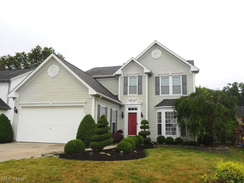 Spectacular newer construction colonial that has been updated/upgraded from top to bottom! There isn't a surface in this home that hasn't been touched - fixtures, paint, flooring, kitchen/baths, windows, doors, appliances and much more! True gourmet kitchen featuring custom hand crafted cabinets (found in many high-end homes in the area), Corian counters, jenn air range/convection oven + convection microwave oven, refrigerator and dishwasher, and whole house humidifier also included! Fall in love with the fabulous floor plan, starting with the open concept eat-in kitchen w/breakfast bar and dinette, which opens to the family room w/gas fireplace, and doors to the concrete patio and private yard - perfect for entertaining. The main floor w/9' ceilings, formal dining room w/tray ceiling, decorative crown molding, and living room with a pressed tin ceiling and bay window, both w/hardwood flooring. Upstairs you will find 4 spacious bedrooms, highlighted by an enormous master suite w/walk-