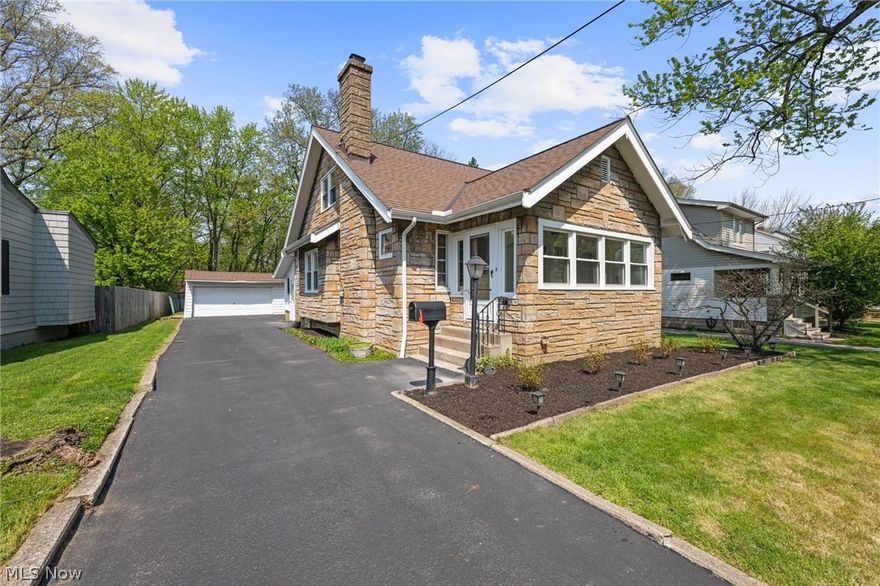 Looking for your dream home? This absolutely stunning, fully remodeled 4-bedroom home is the perfect blend of timeless character and thoughtful modern updates. Original woodwork and rich hardwood floors flow throughout, beautifully preserving the home’s charm while complementing the stylish renovation. A welcoming covered front porch invites you inside to a spacious living room filled with natural light from a large window, anchored by a decorative fireplace and classic built-in cabinetry. The dining room is equally impressive, featuring a seamless mix of original and updated built-ins along with a charming window bench, creating a warm and inviting space for gatherings. The kitchen is truly breathtaking, showcasing crisp white cabinetry, light countertops, a beautifully detailed ceramic tile backsplash, and stainless steel appliances, all included. Just off the kitchen, a cozy sunroom offers the perfect spot to enjoy your morning coffee, with direct access to the backyard. The main level offers the ease of first-floor living, featuring two generously sized bedrooms and a beautifully updated full bathroom. Thoughtfully designed, the bath includes a stylish vanity with storage, a tub/shower combination with ceramic tile, and decorative open shelving, creating a space that feels both functional and inviting. Upstairs, the owner’s suite provides a peaceful retreat with a lofted ceiling and ample closet space. An additional spacious bedroom and a second full bathroom complete the upper level, featuring a walk-in tiled shower and elegant finishes that create a true spa-inspired escape. The unfinished lower level offers endless possibilities, ideal for future living space, a home gym. Step outside to enjoy the partially fenced backyard, perfect for entertaining, relaxing, or gardening, along with a detached two-car garage for added convenience. All that’s left to do is turn the key and make this exceptional home your own. A one-year Home Warranty is included.