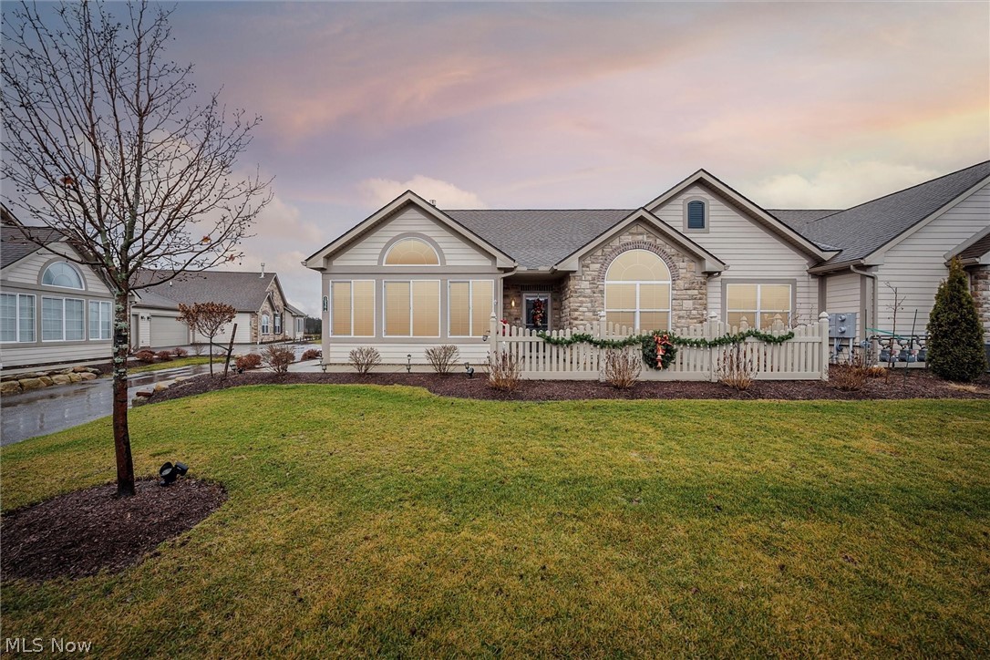 Beautiful, meticulously maintained 3-year-old condo, adjacent to the Boulder Creek Golf Course and Barrel Lodge restaurant. Enjoy all that the Fairways of Boulder Creek has to offer, including maintenance free living, fitness room, heated outdoor pool, and private clubhouse. Built in 2019, this exceptional home offers one-floor living and an open layout, creating a welcoming entertainment space. As you enter the centrally located vaulted great room, you are greeted with the warm ambiance of the corner gas fireplace, opening to the formal dining area and spacious kitchen! The stunning gourmet kitchen features breakfast bar, spacious pantry, stainless steel appliances, abundant cupboards, granite countertops, tile backsplash, as well as under cabinet lighting. Generous sized laundry room with cabinets & Utility Tub, plus off of there is a bonus 7 x 6 storage area. The master suite features a full bath w/Shower, raised Vanity w/Double sinks, Walk-in closet, & Linen Closet. The guest bedr