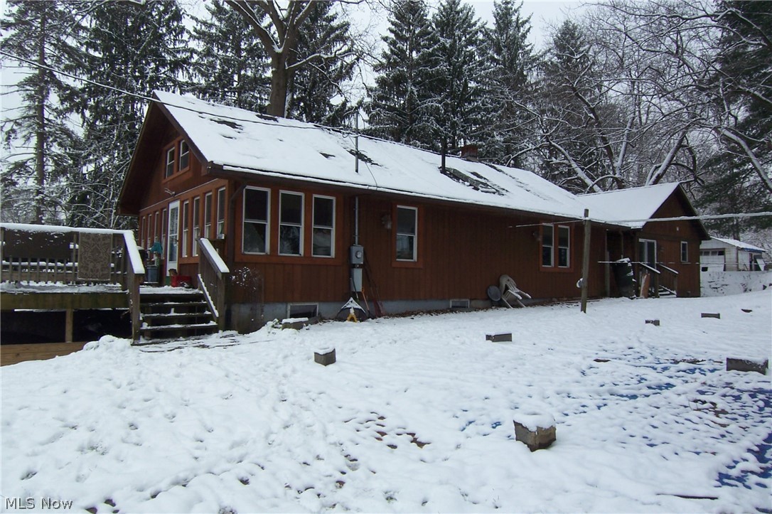 Rustic private setting close to everything! Unique home with cathedral open loft and in law suite (2004) which consists of bed, bath and living room with separate entrance! 1st floor laundry! Kitchen remodeled 2014 w/granite counters! Windows replaced 2015 & 2016! Central air Aug 2020 and electric updated and hot water tank! Roof 2004 with repairs on disclosure. March 2012 new well drilled! 2 skylights! 2 decks and fenced yard with 4 gates! Volley ball court! Peach tree and blueberry bush! Wood burning stove! 2 car carport! Loft low ceiling and not counted in sq ft. Selling as is.