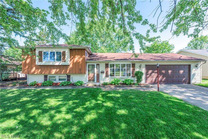 This spacious split-level home boasts 3 comfortable bedrooms and 2 full baths, providing ample space for family living. The main floor features a bright living room perfect for relaxation, while the lower level offers a cozy family room ideal for entertainment. The kitchen is well-equipped with all appliances, ensuring convenience for meal preparation. The home has been maintained with a roof peak updated in 2010 and the rest in 2017, ensuring long-lasting durability. Situated on a fenced-in, tree lot, the property provides privacy and a serene atmosphere. Conveniently located close to shopping and highways, this home is perfect for commuters and shoppers alike. The backyard is a highlight, featuring a spacious patio that is perfect for gatherings and outdoor activities.