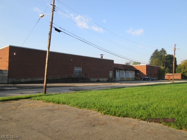 Warehouse with office space with a total of 47,898 square feet.e. All public utilities. All brick exterior. First floor: 12 offices, storage room, conference room, lunchroom, 2 restrooms, warehouse, 2 refrigerated storage rooms, shipping/receiving dock, 2 cooler rooms, warehouse office. Second floor: 10 offices, 2 restrooms, storage room, open office. 5 truck docks, 3 drive-in doors.