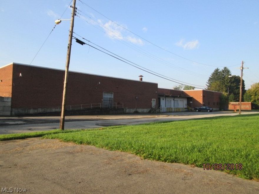 Warehouse with office space with a total of 47,898 square feet.e.  All public utilities.  All brick exterior.  First floor:  12 offices, storage room, conference room, lunchroom, 2 restrooms, warehouse, 2 refrigerated storage rooms, shipping/receiving dock, 2 cooler rooms, warehouse office.  Second floor:  10 offices, 2 restrooms, storage room, open office.  5 truck docks,  3 drive-in doors.