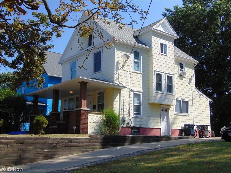 Investment opportunity near the University of Akron! 4 bedroom, 1.5 bath home with plenty of off street parking. Unique opportunity to purchase this property and the adjacent 0.2045 acre lot (parcel 68-61880) together. New paint, carpet, flooring (2013). Refrigerator, washer/dryer, windows on 2nd & 3rd floors installed in 2013. Finished attic space offers two additional bonus rooms. Security system in home too! Good rental history. HMS Home Warranty included. Agent owned.