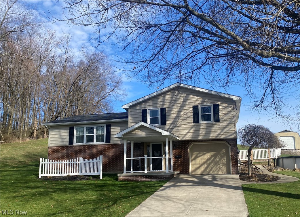 Won’t Last!! This immaculate multi level home boasts more space than it looks. As u enter the home from the cozy front covered porch you will see the spacious entry foyer on main level w/large storage closet, a private bath and separate laundry/utility rm. The 2nd floor features a warm and inviting living space w/natural lighting. The kitchen has abundance of cabinets and counter space open to the dining area w/floating shelves and buffet cabinet for extra storage. Located off the kitchen, step into a beautiful sun rm recently updated w/new vinyl flooring & fresh paint. The third level features beautiful master bdrm w/2 double closets and 2 additional bedrms. More features included in this wonderful home is the spacious family rm in lower level plus additional 16’ X 12’ storage rm. You will love the amazing outdoor space w/multilevel composite decks, 2 brick patios, barbecue/fire pit area plus 20ft round above ground pool w/new liner. Extra bonus is the 24’ X 14’ storage bldg great for storing pool equipment, mower and outside furniture.
List of improvements available w/items staying, not staying & a few items available for sale by owner.