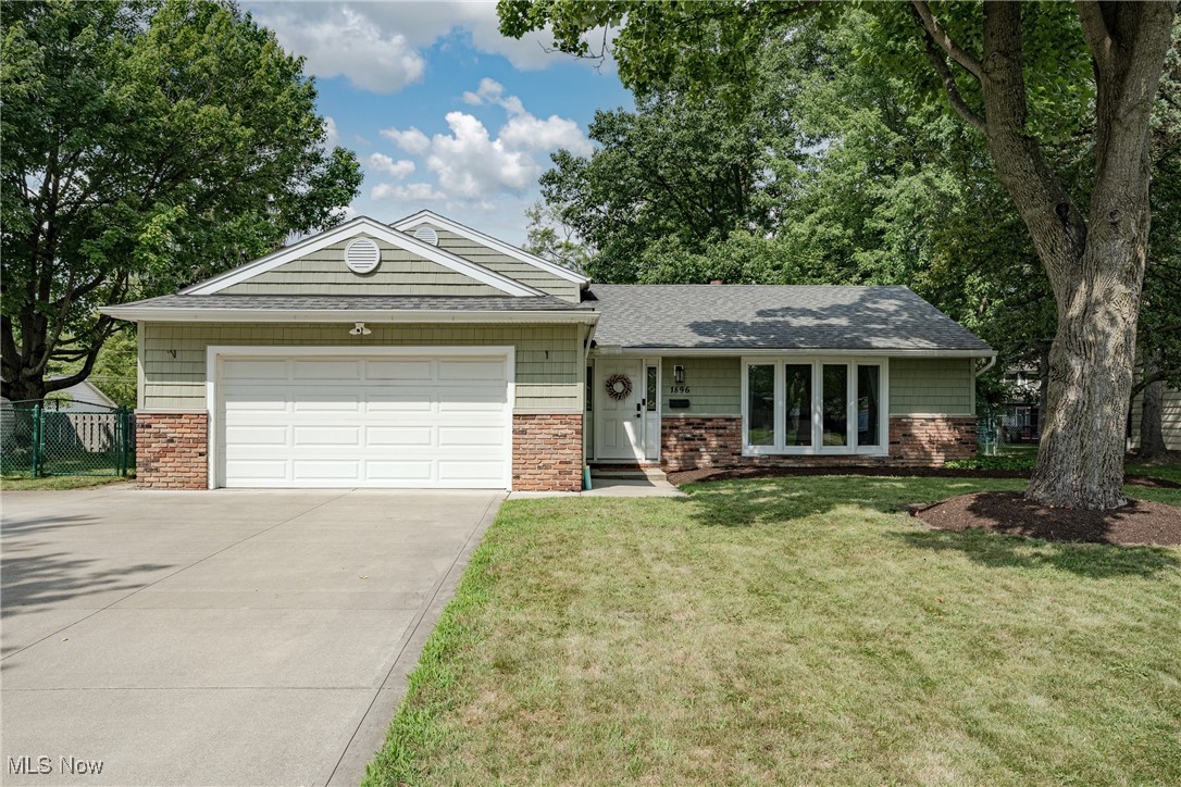 Welcome to 1896 Bromton Dr, Lyndhurst – A Beautifully Maintained Split-Level on a Peaceful Street!
This meticulously cared-for home offers a perfect blend of style, comfort, and functionality in a prime location. From the moment you step into the welcoming foyer, you'll feel right at home. The spacious living room is filled with natural light from a charming bow window and features updated luxury vinyl plank flooring that flows seamlessly throughout the entire home. The open-concept layout continues into the dining room, making it ideal for entertaining. The adjacent kitchen is tastefully updated with granite countertops, a tile backsplash, stainless steel appliances, and modern cabinetry—combining both beauty and practicality. Upstairs, you'll find three comfortable bedrooms with the same durable LVP flooring. The primary bedroom boasts a sliding barn door that leads to a stylish ensuite full bathroom. A second full bath is conveniently located off the hallway. The lower level offers an expansive L-shaped rec room—perfect for a playroom, media space, or home office—as well as a laundry room and a convenient half bath. The basement level serves as a utility/storage space. Step outside to enjoy the fully fenced backyard, complete with a covered patio for outdoor dining and relaxation, and a storage shed for your tools and gear. Additional updates include a full roof replacement in 2016, providing peace of mind for years to come. Located just minutes from shopping, restaurants, schools, and easy highway access, this move-in ready home checks all the boxes. Don't miss your chance to own this charming Lyndhurst gem!
