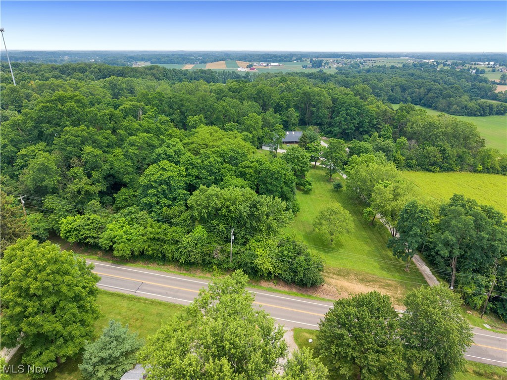 Bring your own Builder and build your dream home on this lovely 2.67-acre lot surrounded by mature trees in a peaceful country setting yet still within a short commute drive to highways, dining, and shopping. Located in Lake Township within North Canton School District. Soil test completed 2022