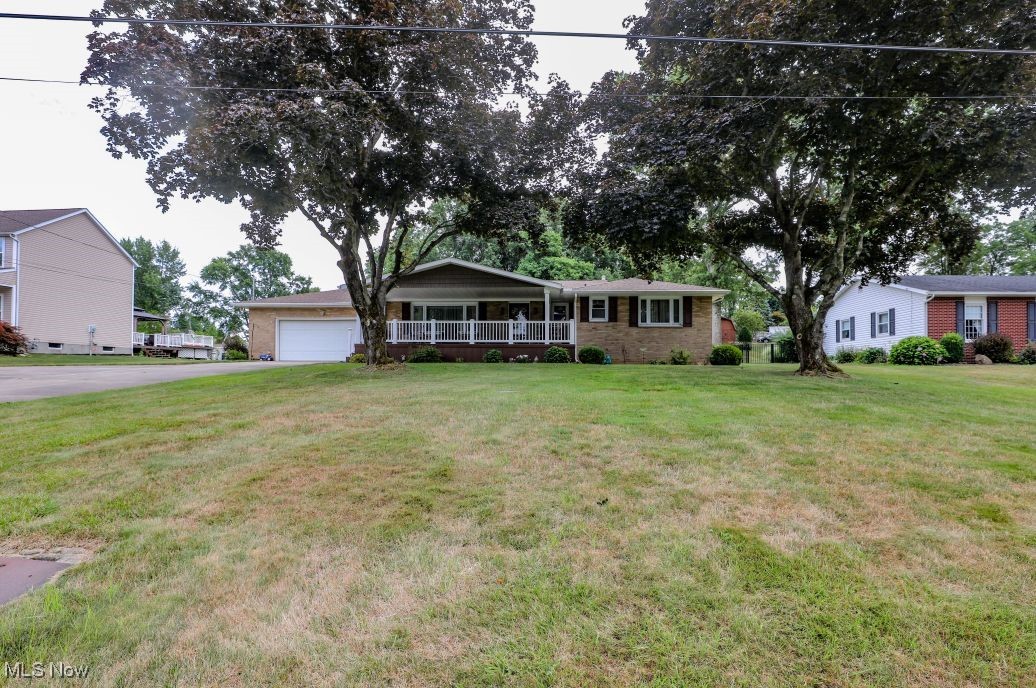 This well-maintained Brick Ranch is being offered for sale for the first time ever. It features 1623 sq. ft. of living space with 3 spacious bedrooms including the primary bedroom with an en-suite half bathroom, 1.5 total bathrooms, large living room, an eat-in kitchen with ample cabinetry, and a cozy den/family room. Additionally, there is a newer Trex covered front porch, a stamped concrete patio out back, a heated 2-car attached garage, and a concrete driveway with turn-around. This home has had tons of updates over the last 5-6 years including: front porch added 2022, New water softener 2021, new electric service 2023, new roof in 2019, new hot water tank 2023, new furnace in 2019, new AC unit 2022, new walk-in shower 2022, and more! Schedule your appointment today!