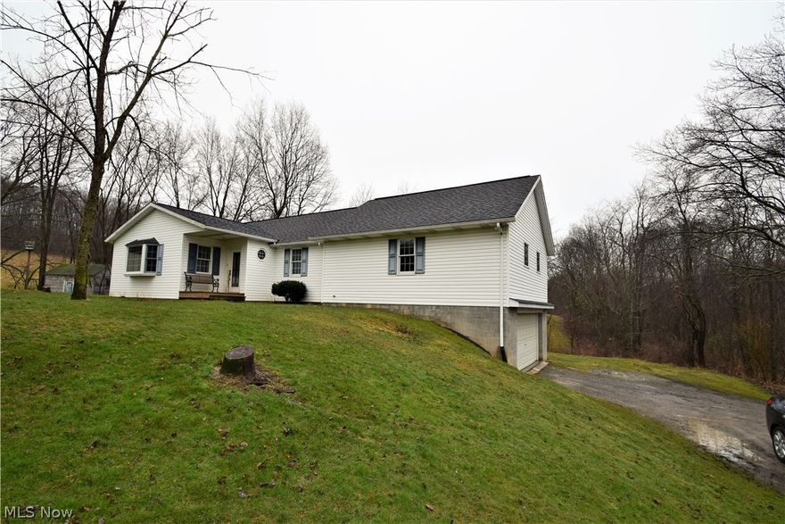 Beautifully maintained ranch home in a country setting that's only 10 minutes from town! Three bedrooms with a first floor laundry or four bedrooms with the laundry in the basement. The three large bedrooms all have walk-in closets! The eat-in kitchen with an abundance of lighting consists of Craftmade soft close cabinets, heated ceramic tile floor, Quartz countertops with breakfast bar, commercial gas range/oven, pot filler faucet, double sink, stainless refrigerator and dishwasher! The first floor windows have been replaced with Anderson Windows. The rear decking has been replaced with composite decking and vinyl railings & banisters. This home offers plenty of room to grow with a unfinished basement. Hot water heater installed April 2018.