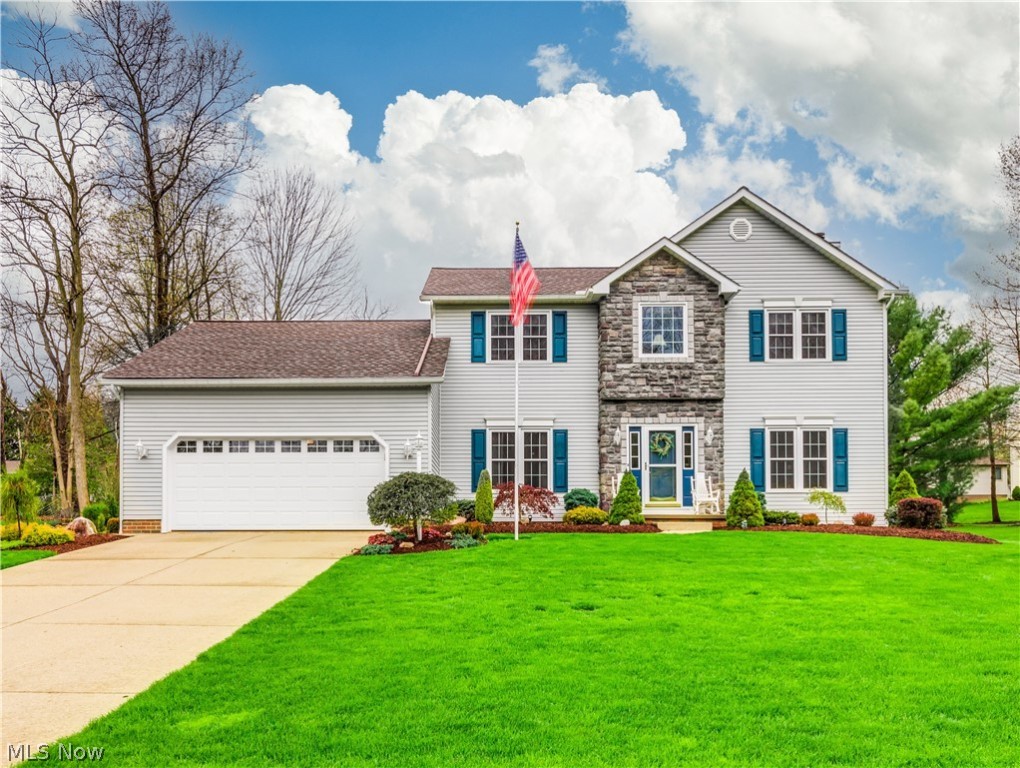 Looking for a pristine home maintained with excellence? Prepare to be impressed with this Colonial in a highly desirable Stow community. Step into the two story open foyer entry with beautiful hardwood floors that continue into the formal dining room with double tray ceiling. Or step down into the cozy great room with Brazillian Teak floors and a gas fireplace. The eat in kitchen has beautiful oak cabinets, granite counters and newer stainless appliances. The kitchen french door leads to the paver patio and parklike semi private back yard. The first floor also has a bedroom or office,1/2 bath and first floor laundry. The second floor has three spacious bedrooms and two full baths including the master suite with a cathedral ceiling and the master bath has double sinks, a soaking tub and separate shower. The lower level includes two finished areas professionally done and two nice sized storage areas. These updates were done between 2012-2020: new roof with extra attic insulation, new w