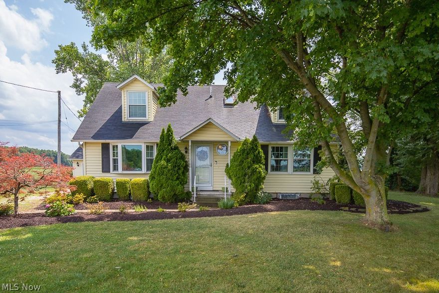 Welcome home to the gorgeous Cape Cod. Just a little over 5 acres of peace and tranquility. Three bedrooms, two Full baths! As you enter the front door, you will see a formal living room. A first floor owner suite with full bath. First floor laundry! Kitchen is a Chefs Dream come true!! The Beautiful mocha cabinets with granite. Appliance equipped, stove, refrigerator, microwave, and dishwasher! Center Island is huge!! Magnificent decorative backsplash. All of the cabinets have the Pullout drawers with the soft close. Upstairs, you will find two bedrooms and a full bath. Home has a full unfinished basement. Off the kitchen you will find sliding glass doors that lead to a deck. Detached Two Car garage. You’ll also see solar panels in the back which assist in the electric bill. Call today for your personal tour.