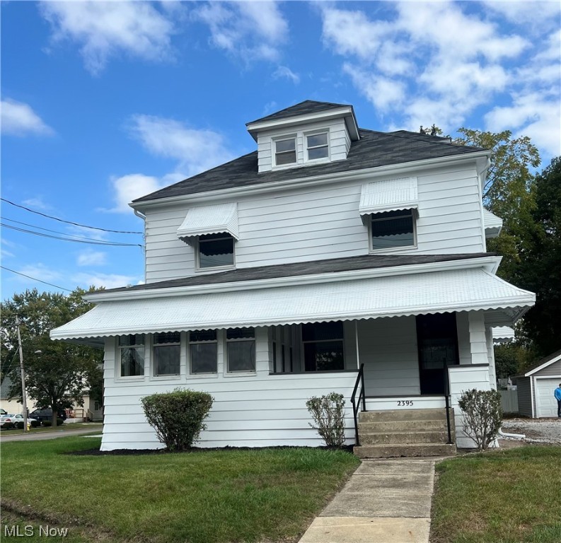 Welcome home to this charming 4 bdrm 1.5 bath colonial at 2395 East Ave. Sitting on 3 parcels in Akron, this home is truly a must see! Step into the jaw dropping living rm with 9ft ceilings, loads of natural light, & stunning hardwood floors/woodwork which leads into the lovely sunroom. The dining rm has built-ins and plenty of space for the entire family. The kitchen boasts plenty of counter space, white cabinetry, & all appliances equipped. Finishing off the main floor is a convenient half bath. Upstairs you will find 3 LARGE bedrooms with ample closet space and fresh carpeting. The full bathroom has also been recently updated and has its own walk-in closet. The third floor offers a massive 4th bdrm suite with tons of windows and highs ceilings to turn it into your own private oasis. The basement features new glass block windows, new HWT, and loads of storage space. Do not miss out on this gem! Schedule your private tour today