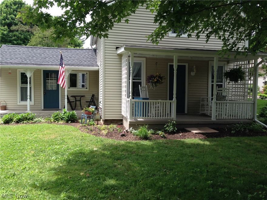 Charming Century home in Historical Burton Village that is in move-in condition.  Since 2002:  Roof, Hot water tank, furnace, air conditioning, stamped concrete back patio, updated electric, rebuilt garage/workshop.  Since 2012:  carpet--downstairs,staircase,up hall; new floor in 1 bedroom up; paint--downstairs and 1 bedroom up, hall.  New molding downstairs, partial privacy wood fence in back yard, repaired/painted front porch, replaced light fixtures, added GFI's.  Pretty yard with 2 pear trees, 2 plum trees, 25 raspberry bushes, nice size garden area.  The 2 car detached garage was rebuilt in 2003 with lots of storage space and large workshop area.  If you like Century homes, you will LOVE this one!  Everything has been done and it is in move-in condition.